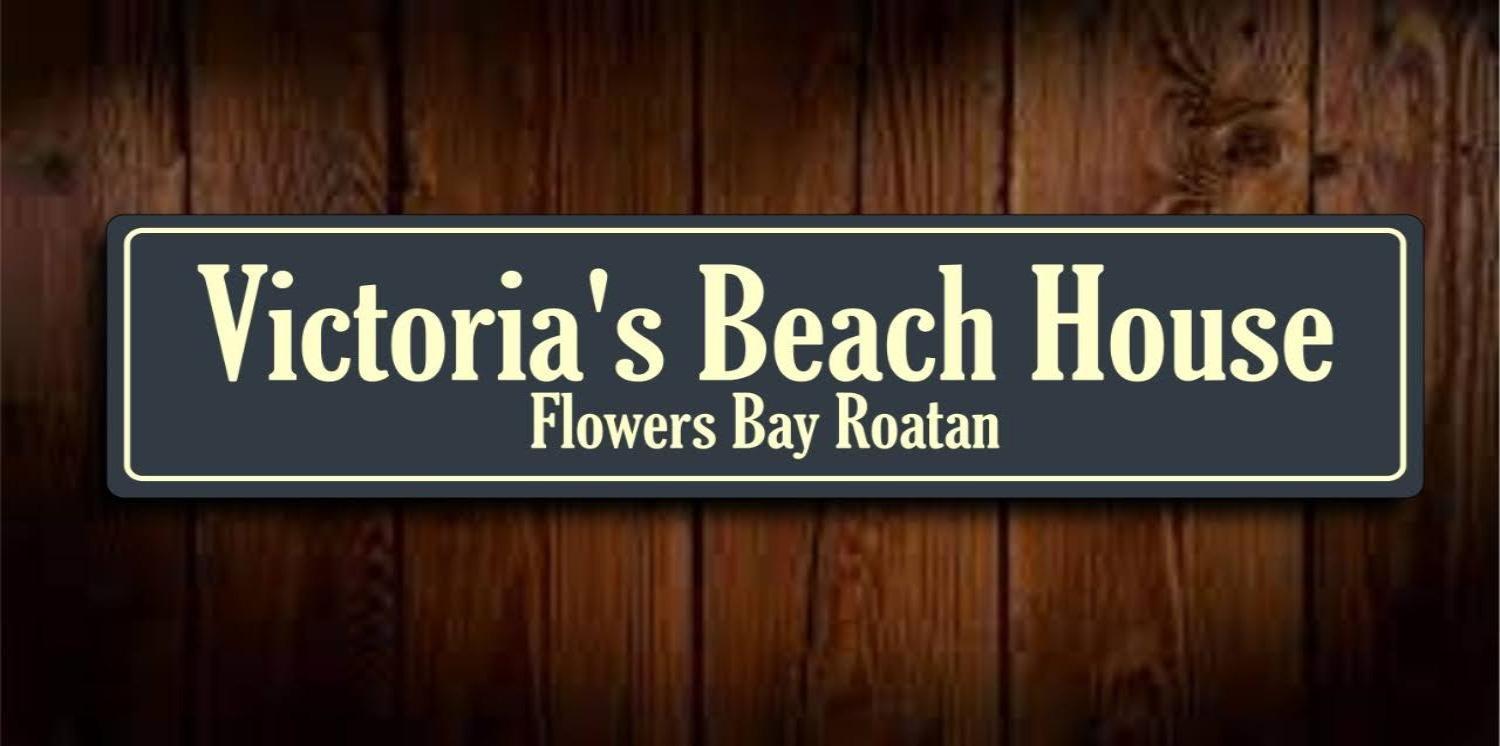 Victoria S Beach House And Snorkeling Center Flowers Bay Extérieur photo